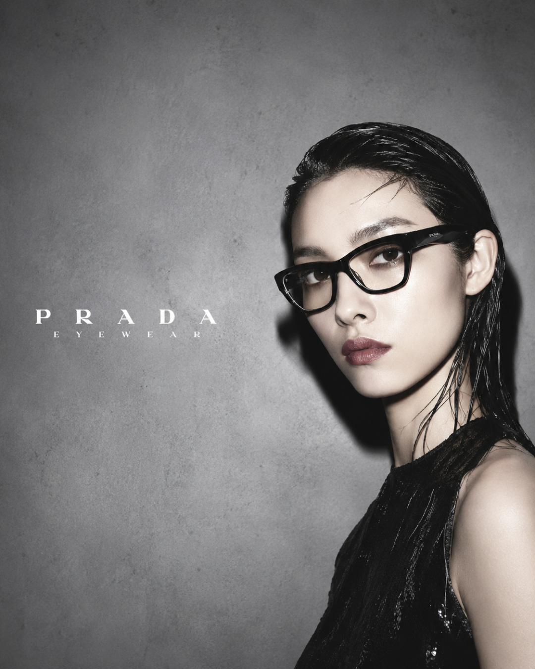 Prada Eyewear black cat-eye designer optical glasses for women featuring a premium luxury acetate frame with modern Italian fashion styling.